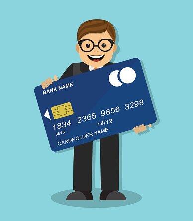 businessman-holding-a-credit-card.